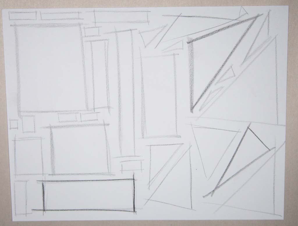 Freehand rectangles and triangles in pencil, with construction strokes extending past the corners.