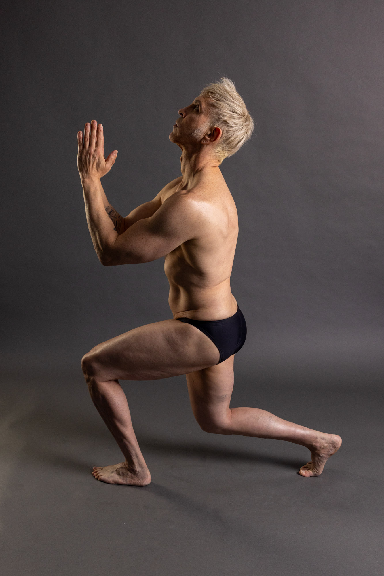 figure drawing reference pose upward torso lift with grounded stance